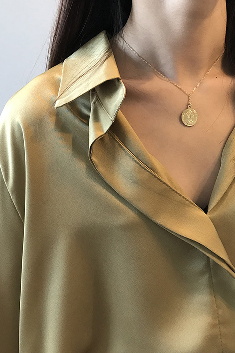A Vintage Style Blouse with Delicate Timeless Details