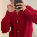 Diana® | Women's wool sweater with a crew neck and button details