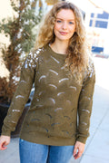 Monica® | Casual, chic olive green knitted sweater with pointelle lace and shoulder neckline