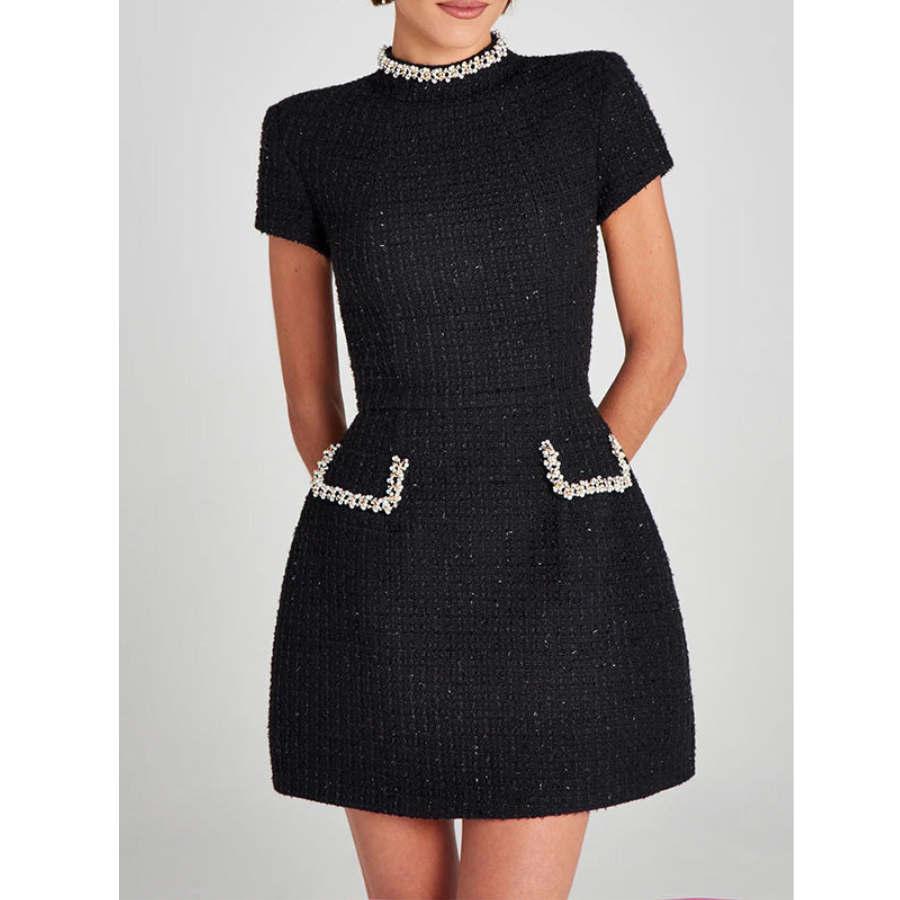 Beautifully Finished Dress in a Timeless Design