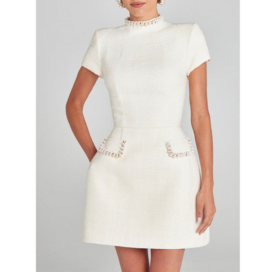 Beautifully Finished Dress in a Timeless Design