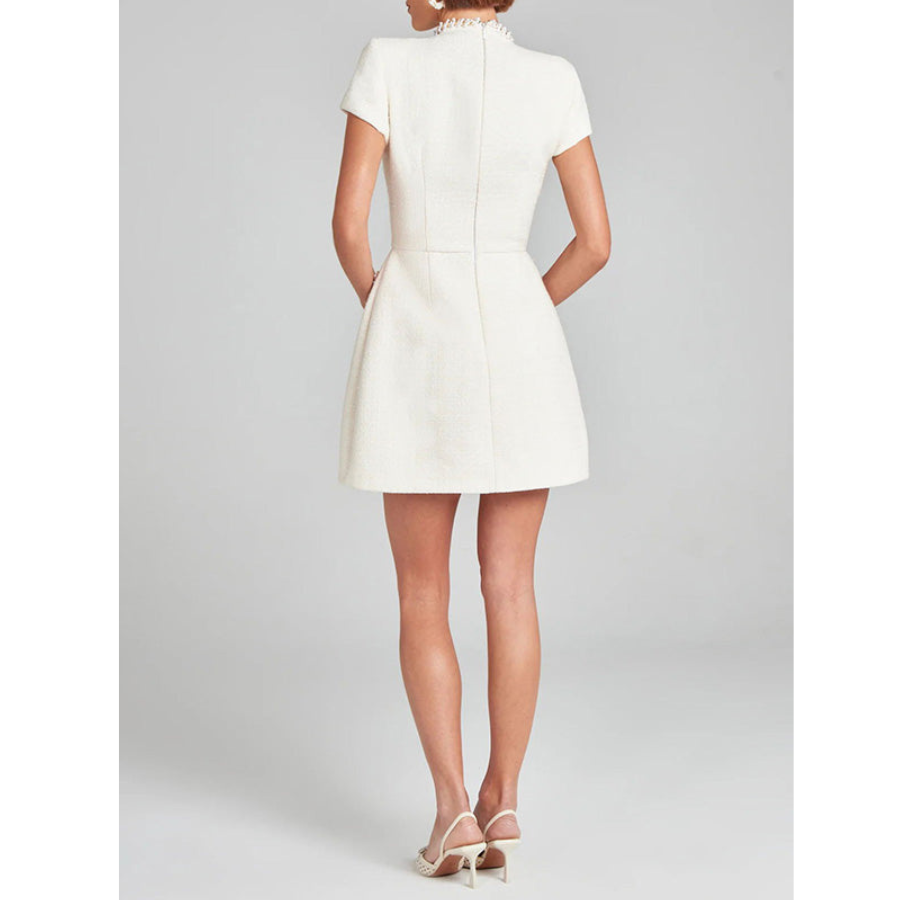 Beautifully Finished Dress in a Timeless Design