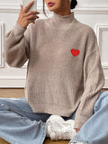 Gabriela® | Long-sleeved turtleneck sweater with a heart pattern and dropped shoulders