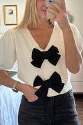 Rae® | Short sleeve, solid color V-neck sweater with double bow
