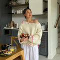 Mariana® | Women's knitted sweater with a loose fit and charming bow details